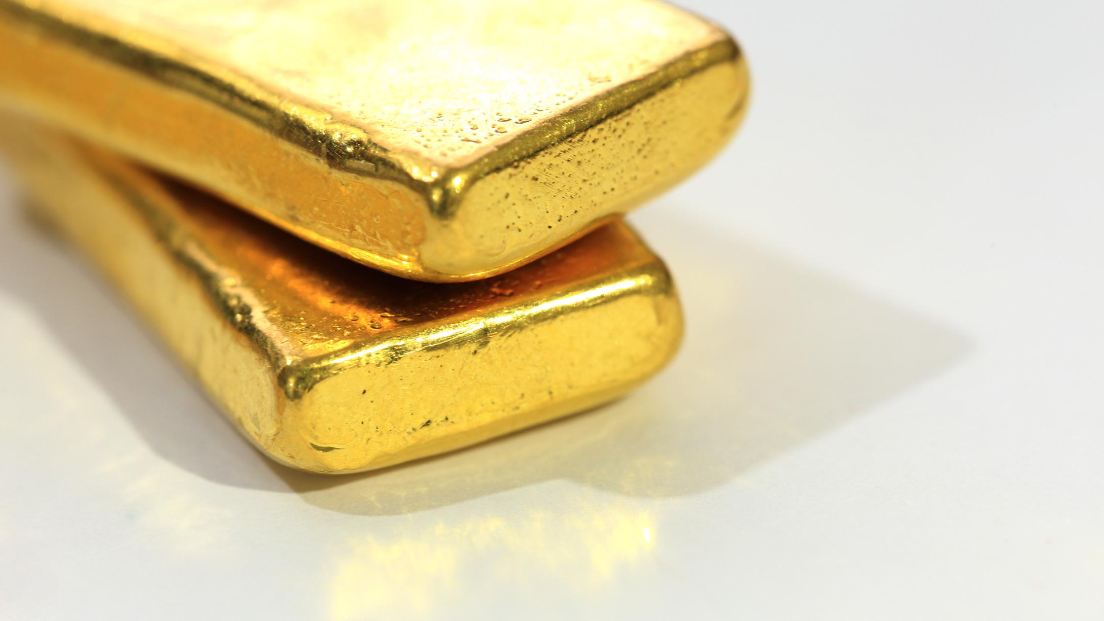 Shiny Gold Bar on White Background.